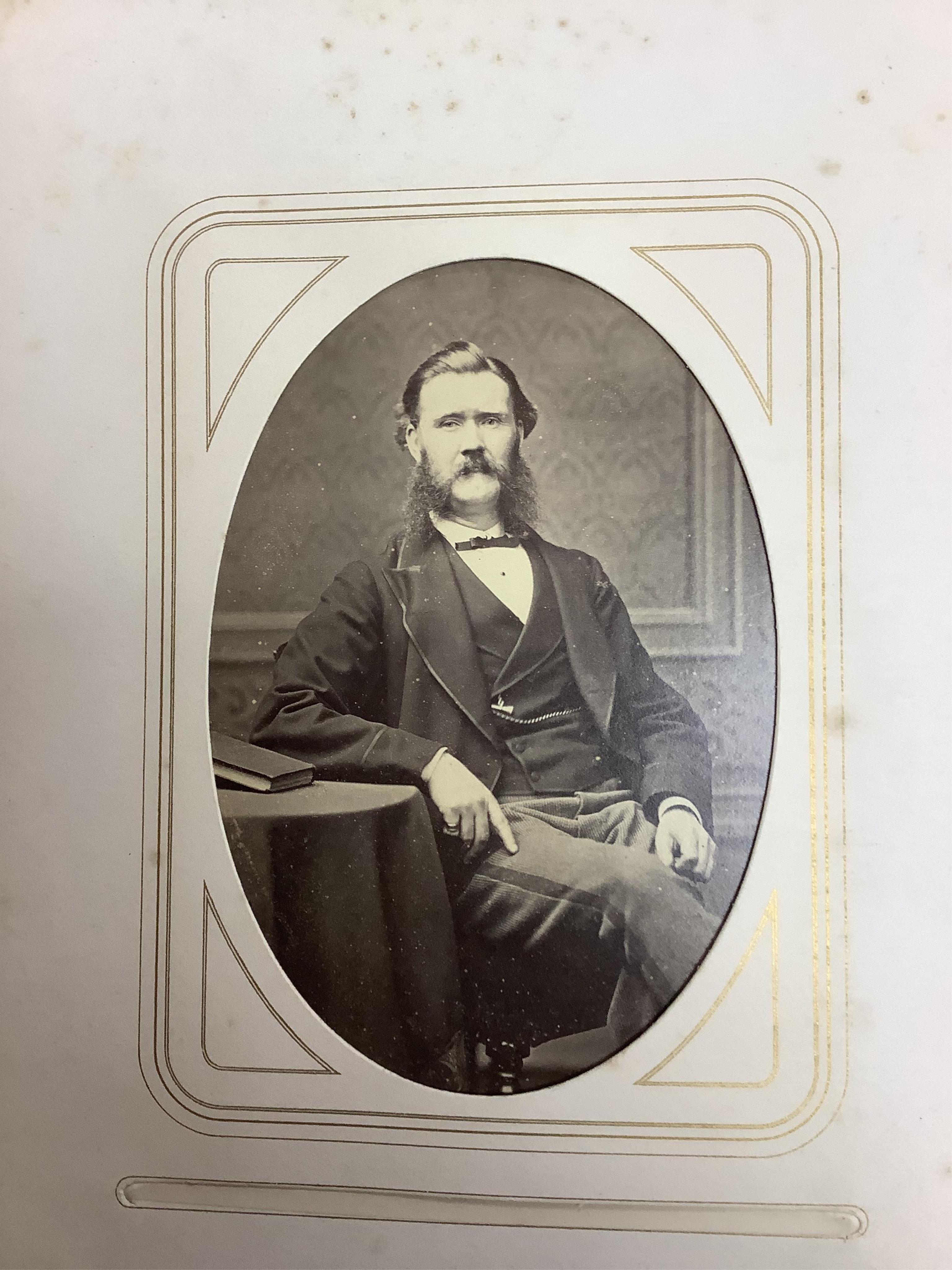 A Victorian malachite mounted amboyna family photograph album, 23cm x 30cm